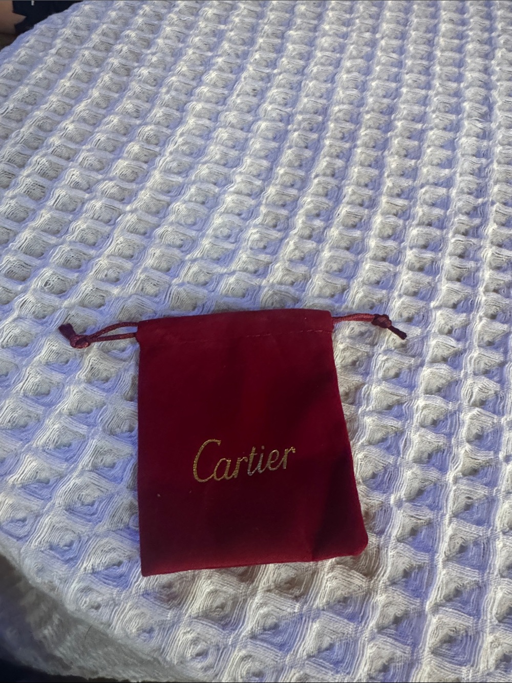 Red Velvet Drawstring Pouch with Gold Logo